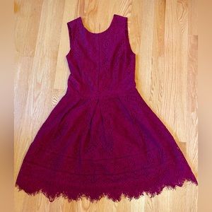 Lace sleeveless mini dress by Adelyn Rae